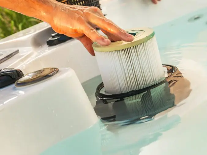 Pool filter being replaced